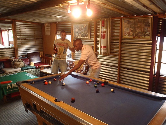 Getting my butt kicked at pool